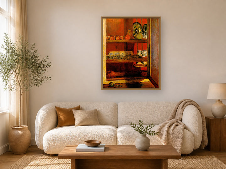 The Red Cupboard by Pierre Bonnard framed wall art print in a living room
