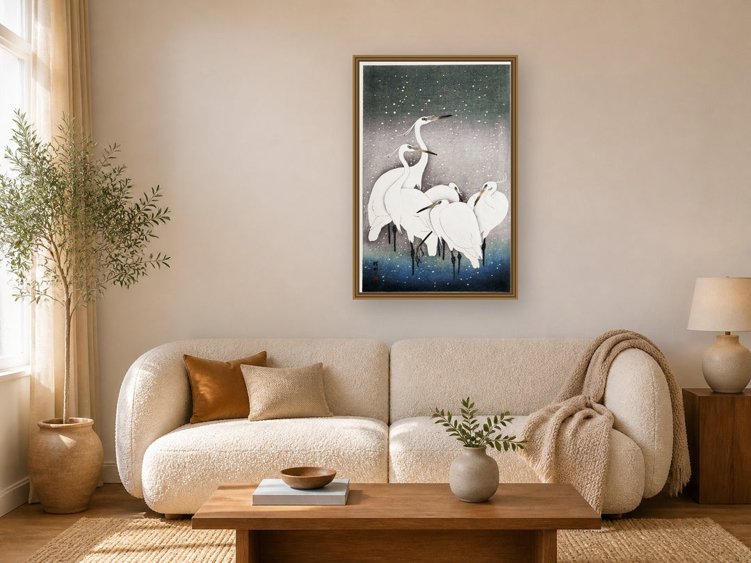 Group of Egrets in Snow framed wall art print in a real living room